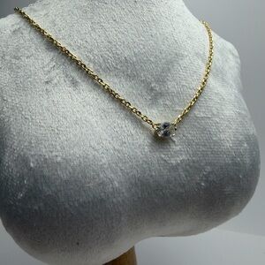 Elegant Kendra Scott Gold Necklace with Clear Stone